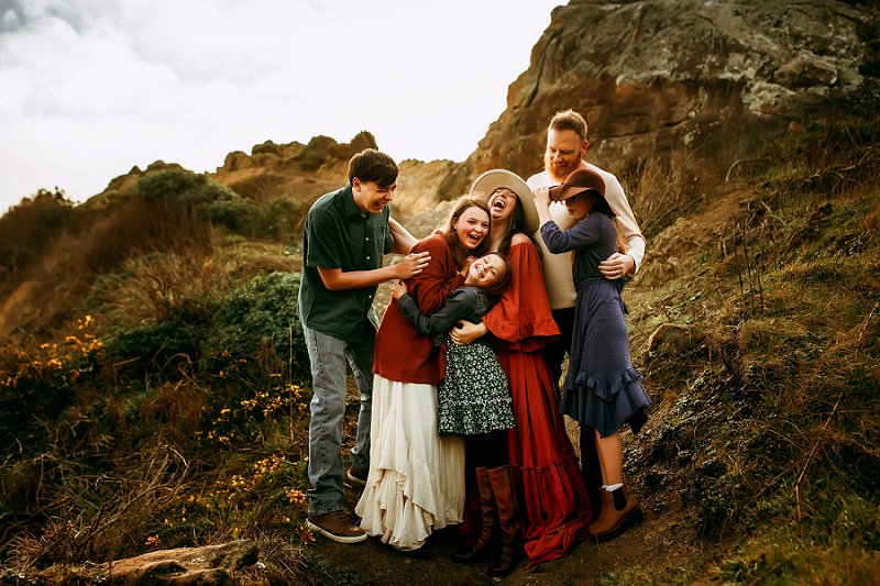 Family Photographer, family of 6 laughing and hugging together